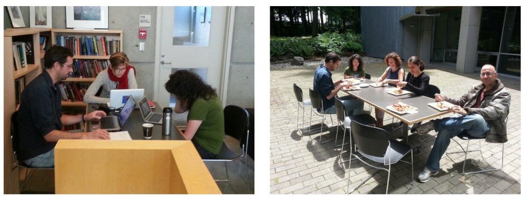 A group of people sitting around a table working on computers during the B.C. regional geography textbook sprint