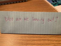 A lined piece of paper with "Who are we leaving out?" handwritten in red pen. 