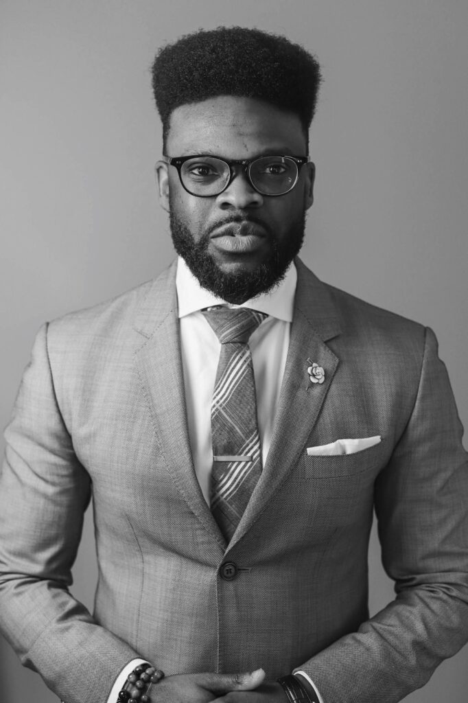 Olaolu Adeleye in suit and tie 